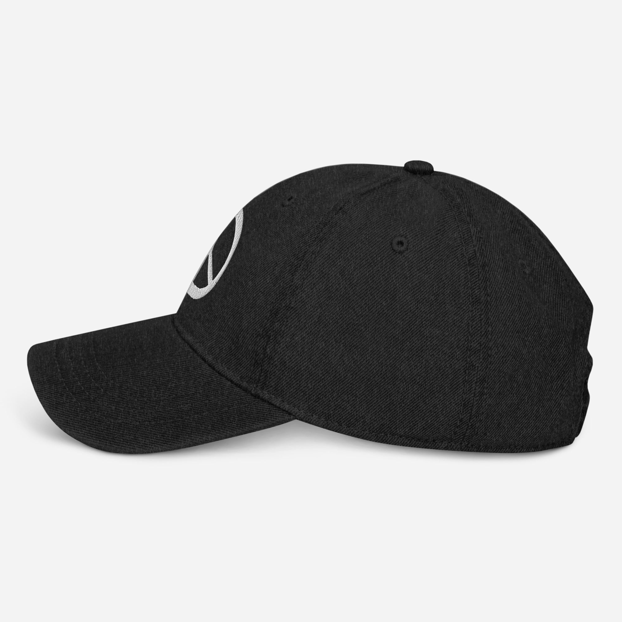 Black denim dad hat with peace symbol embroidery, angled view