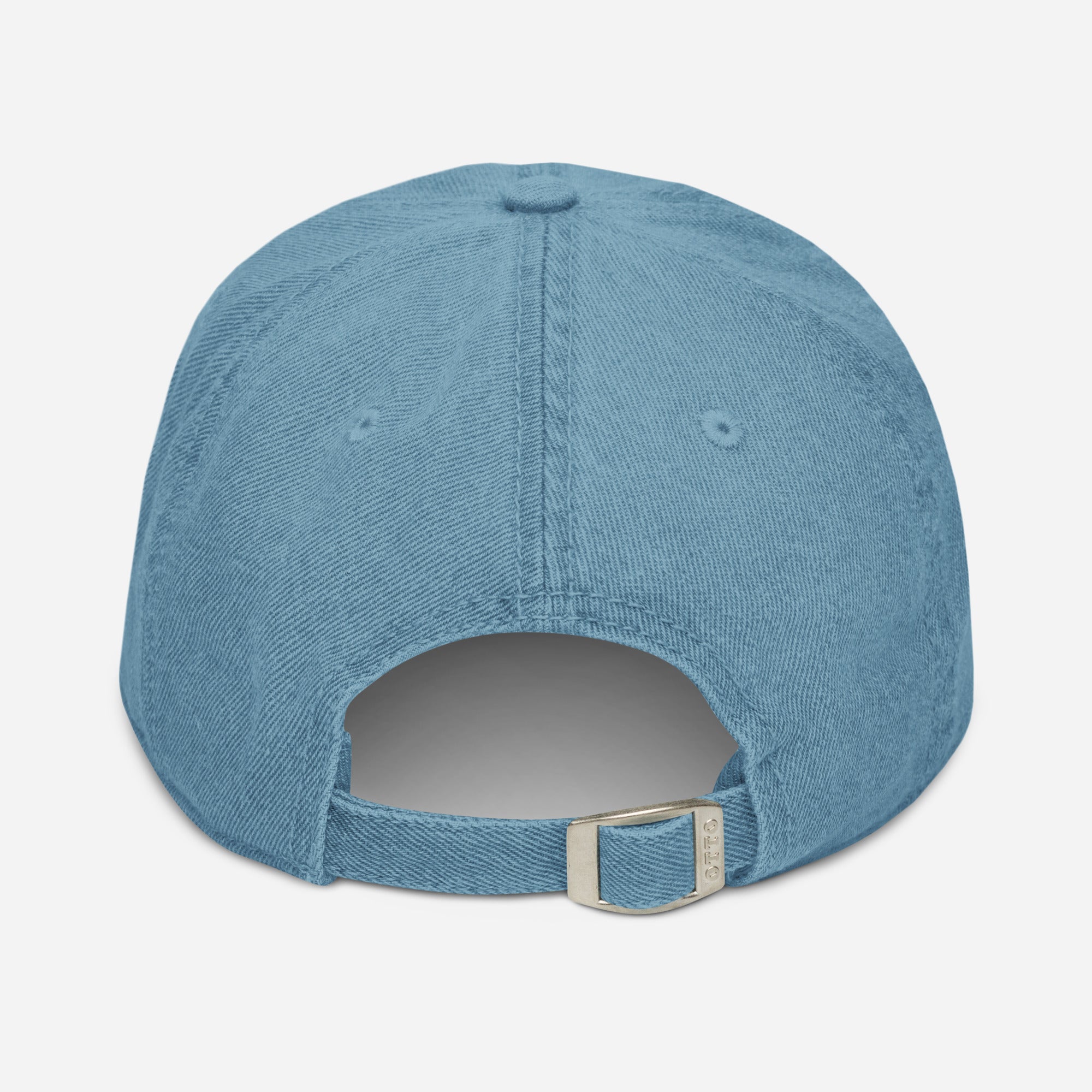 Adjustable strap on denim dad hat, close-up