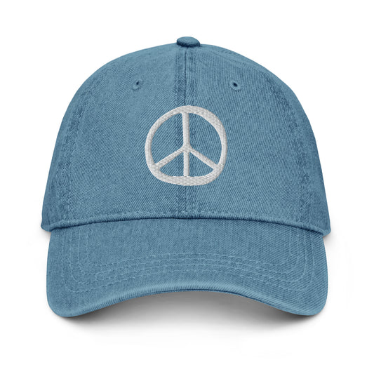 Blue denim dad hat with embroidered peace sign, front view